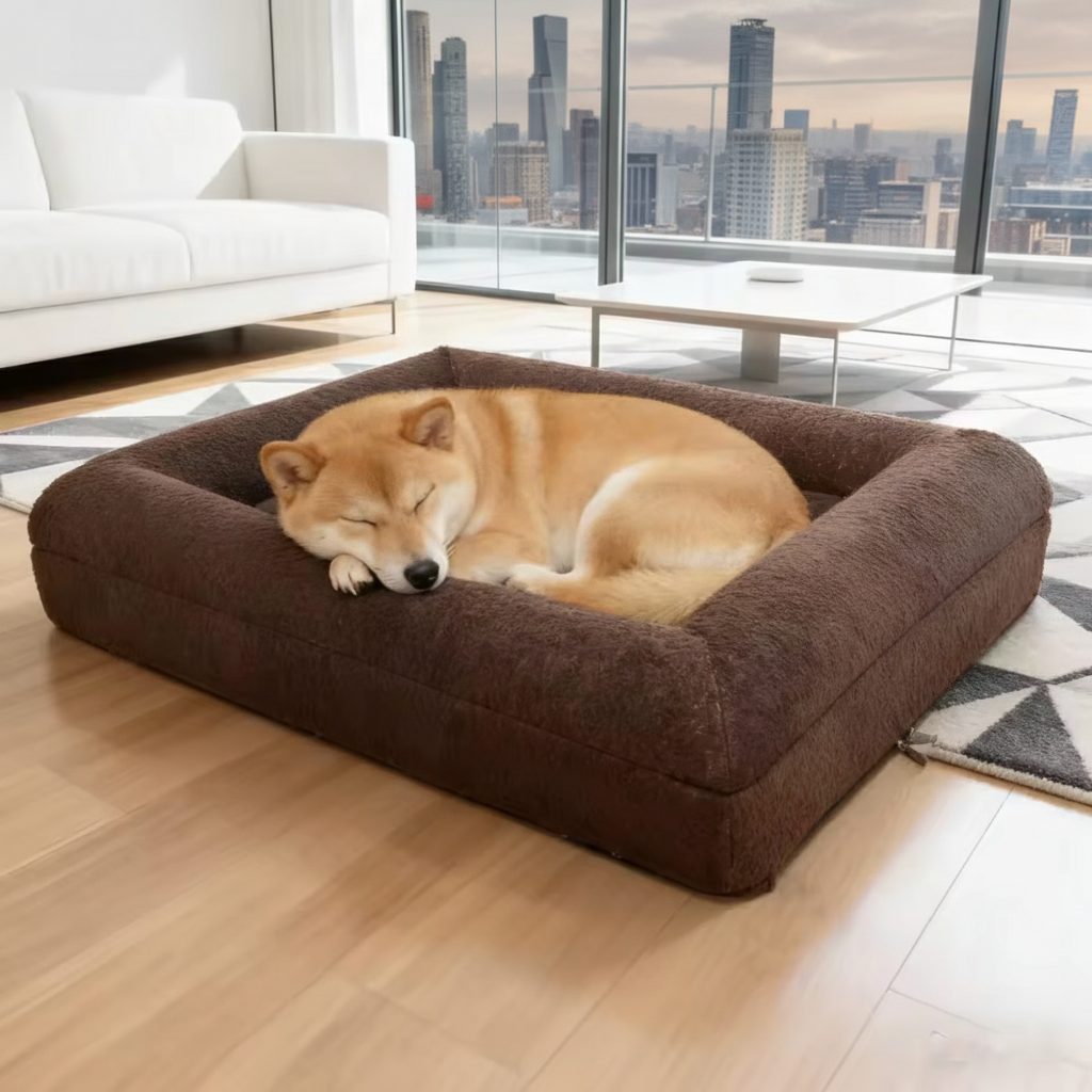 Dog sleeping on a large brown pet bed in a modern living room with cityscape view.