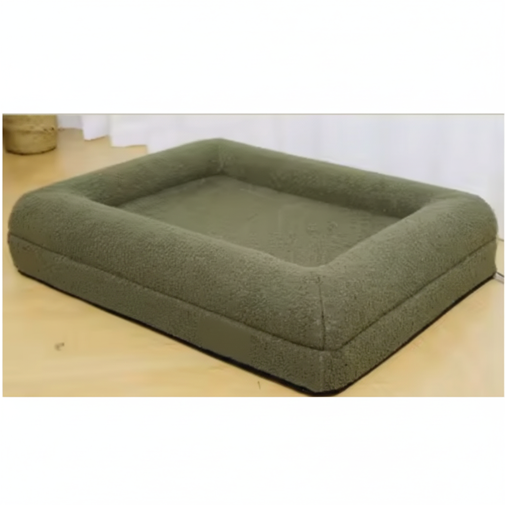 Green pet bed on a wooden floor with a white wall background