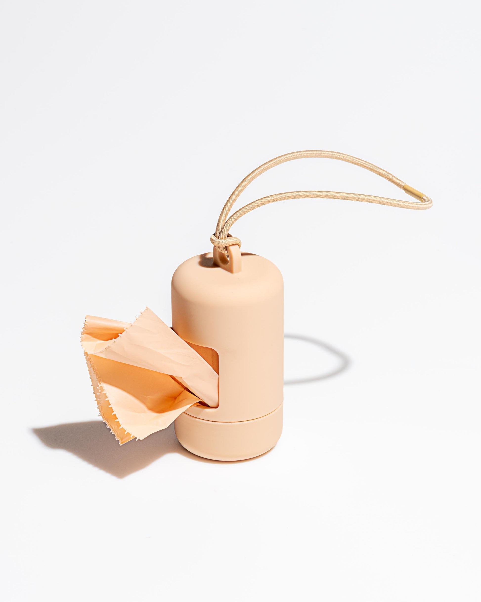 Tula Dog Poop Bag Holder — clips onto any leash or tote with an elastic strap